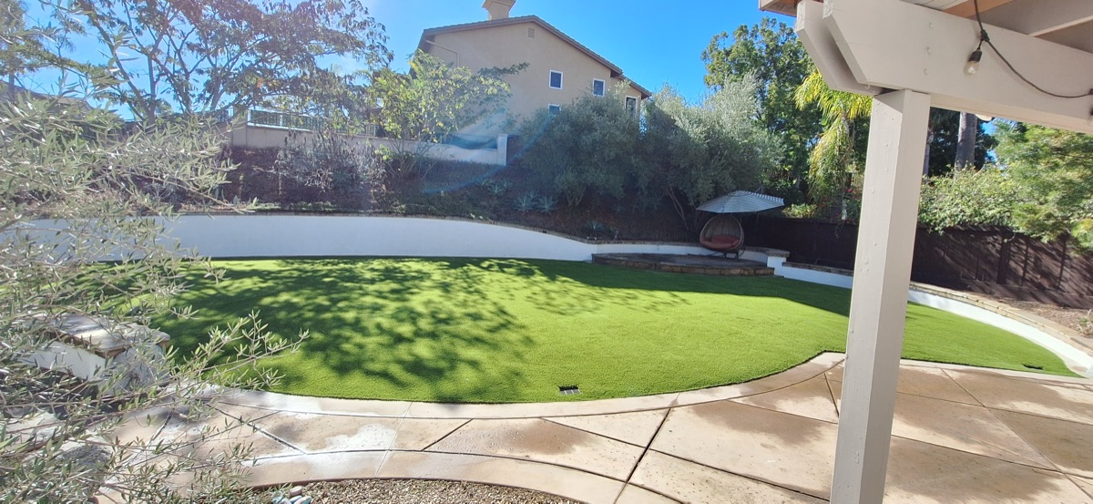 Backyard putting area with patio in Vista, CA